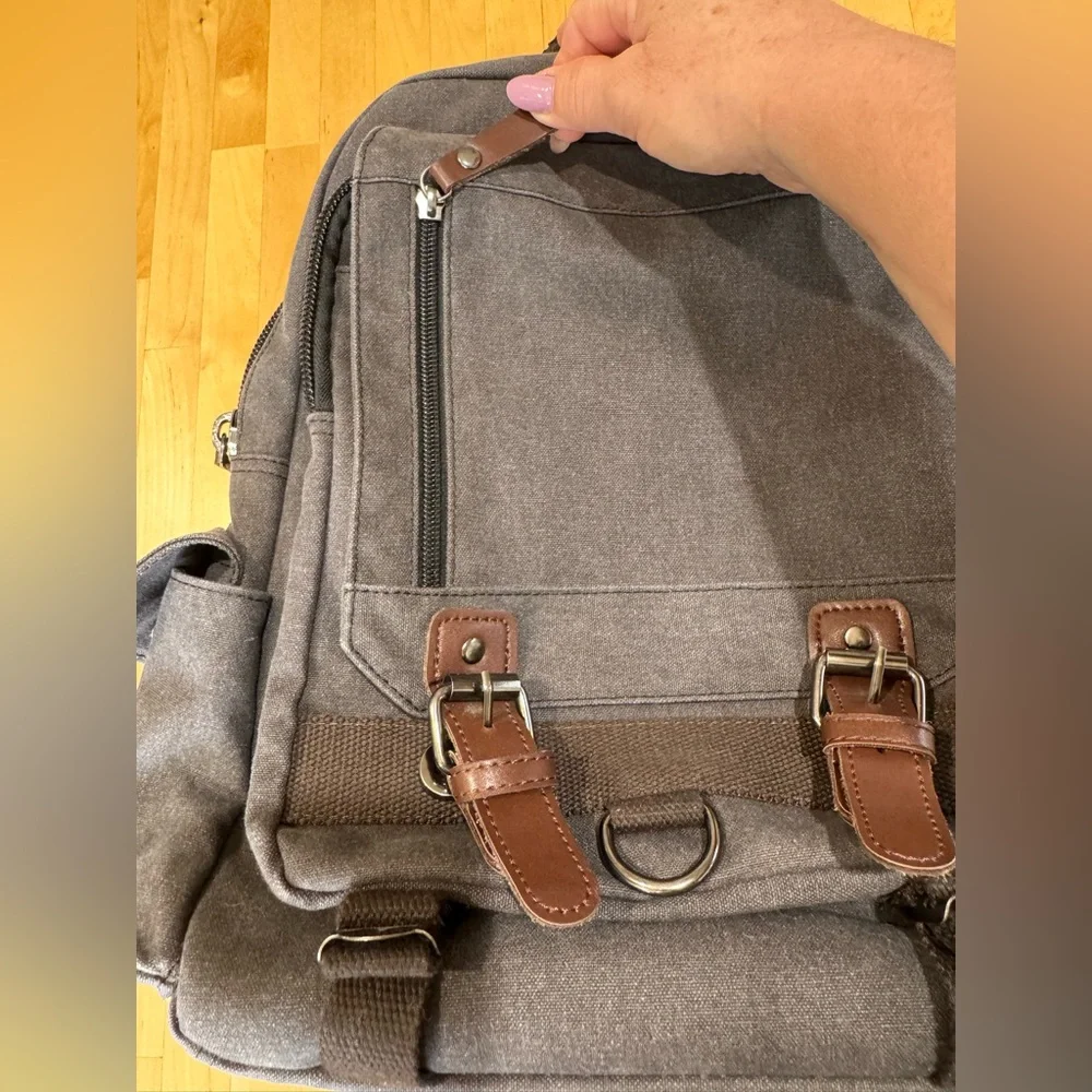 Gray Canvas Crossbody Backpack with Brown Accents Multiple Compartments Durable